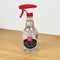 Bottle of Griot's Garage Heavy-Duty Wheel Cleaner with a red spray nozzle on a wooden surface.